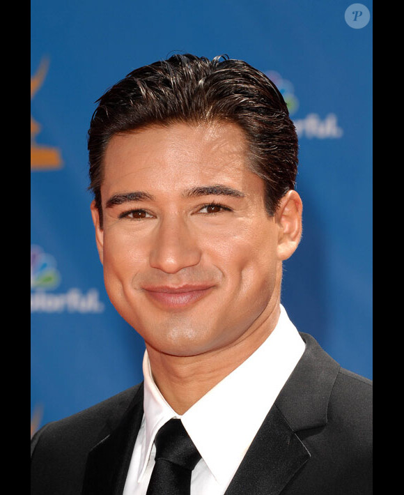 Mario Lopez et sa compagne Courtney Mazza, posent lors d'une soirée privée à Los Angeles, en août 2009