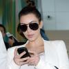 Kim Kardashian arrive à l'aéroport de Miami après un séjour aux Émirats Arabes Unis pour lancer deux nouvelles franchises de Millions of Milkshake. Miami, le 2 décembre 2012.