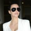 Kim Kardashian arrive à l'aéroport de Miami après un séjour aux Émirats Arabes Unis pour lancer deux nouvelles franchises de Millions of Milkshake. Miami, le 2 décembre 2012.
