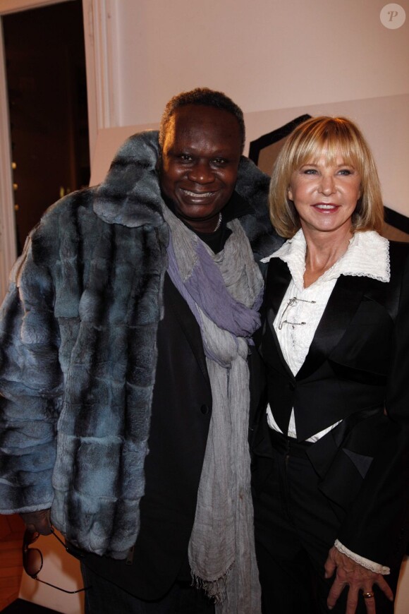 Magloire et Marie Christiane Marek à la 17ème édition des Sapins de Noël des Créateurs à l'hôtel Salomon de Rothschild à Paris le 3 décembre 2012.