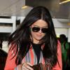 Khloe Kardashian prend l'avion à l'aéroport de Miami, à destination de Los Angeles. Le 3 décembre 2012.