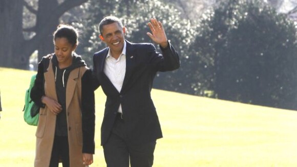 Barack Obama, Michelle et les filles : Retour avec le sourire après les vacances