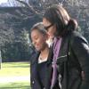 Michelle Obama et sa fille cadette Sasha arrivent à la Maison Blanche à Washington, dimanche 6 janvier 2013.