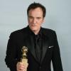 Photocall de Quentin Tarantino et son Globe du meilleur scénario pour Django Unchained, le 13 janvier 2013.