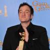 Quentin Tarantino avec sa récompense lors des Golden Globe Awards, le 13 janvier 2013.