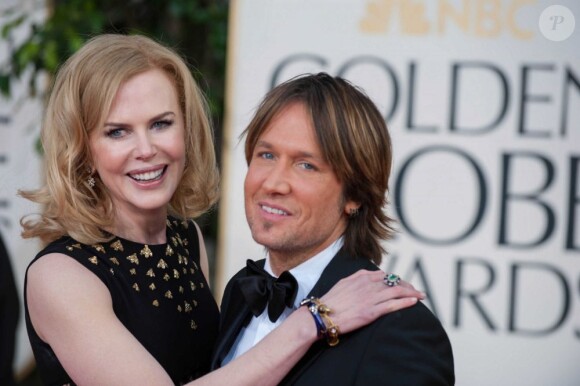 Nominated for BEST PERFORMANCE BY AN ACTRESS IN A SUPPORTING ROLE IN A MOTION PICTURE for her role in 'THE PAPERBOY' and BEST PERFORMANCE BY AN ACTRESS IN A MINI-SERIES OR MOTION PICTURE MADE FOR TELEVISION for her role in 'HEMINGWAY & GELLHORN', actress Nicole Kidman with Keith Urban who is nominated for BEST ORIGINAL SONG ‚- MOTION PICTURE for 'NOT RUNNING ANYMORE" for 'STAND UP GUYS', attend the 70th Annual Golden Globe Awards at the Beverly Hilton in Beverly Hills, CA on Sunday, January 13, 2013.13/01/2013 - 