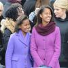 Sasha et Malia Obama lors de la cérémonie d'investiture de leur père qui se tenait devant le Capitole de Washington le 21 janvier 2013