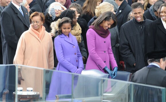 Sasha et Malia lors de la cérémonie d'investiture de leur père qui se tenait devant le Capitole de Washington le 21 janvier 2013