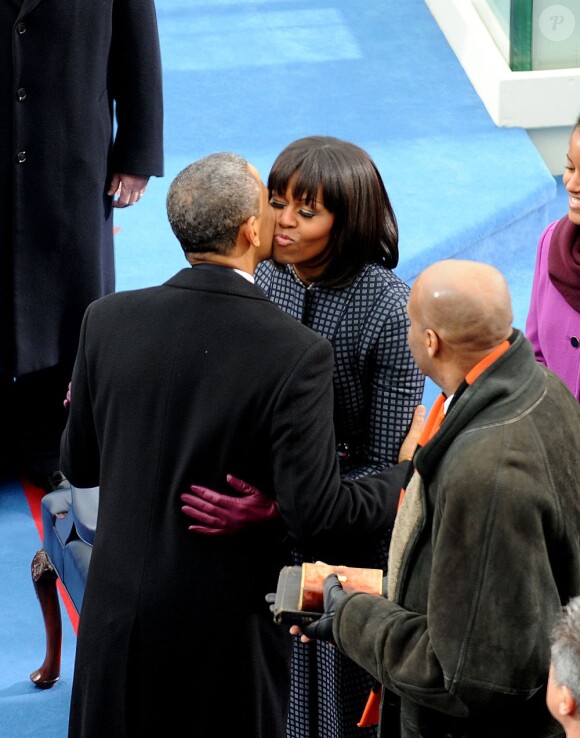 Barack Obama et sa femme Michelle lors de la cérémonie d'investiture qui se tenait devant le Capitole de Washington le 21 janvier 2013