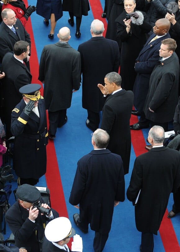 Barack Obama Barack Obama, sa femme Michelle et ses filles Sasha et Malia lors de la cérémonie d'investiture qui se tenait devant le Capitole de Washington le 21 janvier 2013