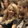 Shakira et son amoureux Gerard Piqué lors d'une conférence du père de la chanteuse à Barcelone le 14 janvier 2013