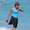 La chanteuse Christina Milian fait son jogging sur une plage de Miami le 25 Janvier 2013.