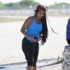 La chanteuse Christina Milian fait son jogging sur une plage de Miami le 25 Janvier 2013.