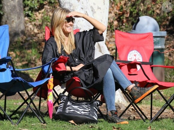 Heidi Klum, ses enfants Leni, Henry, Johan et Lou et son compagnon Martin Kristen dans un parc à Brentwood, le 26 Janvier 2013. Pendant que la famille était au parc, l'ainé Henry participait à un match de football.