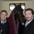 Le cheval Ready Cash qui tire la langue avec Lucien Jean-Baptiste, Fabien Onteniente, et Philippe Duquesne du film  Turf , lors du 92eme Grand Prix d'Amérique à l'hippodrome de Vincennes, le 27 janvier 2013.