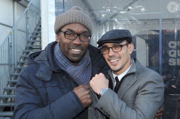 Brahim Asloum avec Lucien Jean-Baptiste du film Turf, lors du 92eme Grand Prix d'Amérique à l'hippodrome de Vincennes, le 27 janvier 2013.