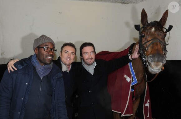 Lucien Jean-Baptiste, Fabien Onteniente, Philippe Duquesne, et le cheval Ready Cash du film Turf, lors du 92eme Grand Prix d'Amérique à l'hippodrome de Vincennes, le 27 janvier 2013.