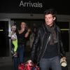 Miranda Kerr, Orlando Bloom et leur fils Flynn de retour à Los Angeles le 27 janvier 2013 après avoir passé quelques jours au Mexique.