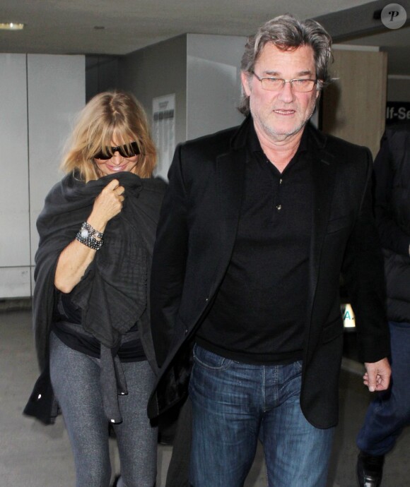 Ensemble depuis 30 ans, Goldie Hawn et Kurt Russell sont ici à l'aéroport de Los Angeles, le 1er février 2013.