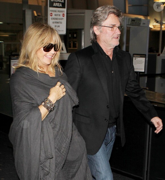Goldie Hawn et Kurt Russell quittent l'aéroport de Los Angeles, le 1er février 2013.