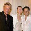 Johnny et Laeticia Hallyday avec Nicolas Sarkozy et Patrick Balkany à Paris, le 29 avril 2007.