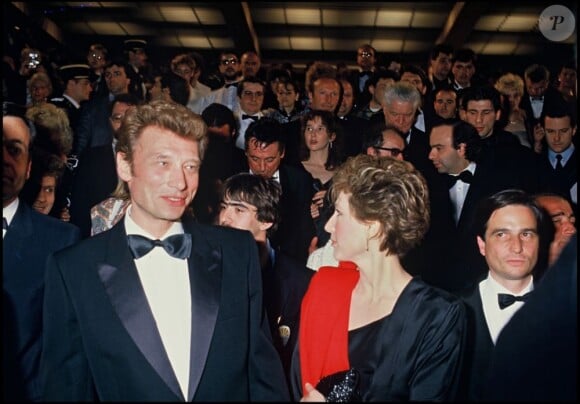 Nathalie Baye, Johnny Hallyday et Jean-Luc Godard au Festival de Cannes le 15 mai 1985.