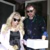 Jessica Simpson, enceinte, à la sortie du restaurant The Ivy, accompagnée de son fiancé Eric Johnson à Los Angeles, le 14 février 2013.