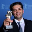 Danis Tanovic reçoit l'Ours d'argent pour An Episode in the Life of an Iron Picker en clôture de la 63e Berlinale, le 16 février 2013.