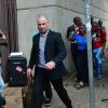 Carl Pistorius, le frère d'Oscar, quitte le tribunal d'instance de Pretoria après la première journée d'audience, le 19 février 2013.