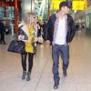 Fergie enceinte et Josh Duhamel arrivent à Londres le 19 février 2013