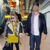 Fergie enceinte et Josh Duhamel arrivent à Londres le 19 février 2013