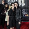 Lana Del Rey et son compagnon Barrie James O'Neil à la soirée des Brit Awards 2013, à Londres, le 20 février 2013. Le couple s'est embrassé sur le tapis rouge.