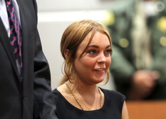 L'actrice Lindsay Lohan au tribunal de Los Angeles avec son nouvel avocat Mark Heller, le 30 janvier 2013.