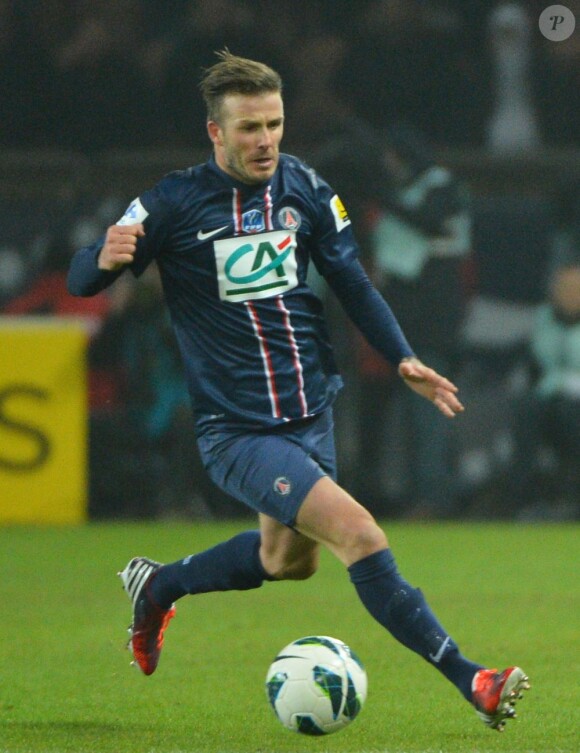 David Beckham en pleine action lors du match entre le Paris Saint-Germain et l'Olympique de Marseille (2-0) le 27 février 2013 au Parc des Princes à Paris
