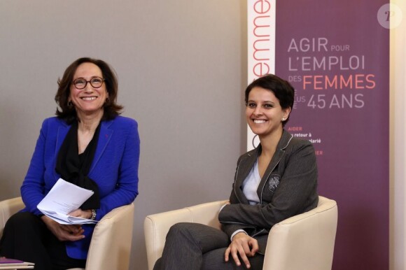 François Hollande et Najat Vallaud-Belkacem lors d'une rencontre avec l'association Force Femmes à l'occasion de la Journée internationale des droits des femmes à Paris le 8 mars 2013