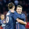 Zlatan Ibrahimovic et David Beckham fêtent leur victoire après le match PSG-Nancy (2-1) au Parc des Princes à Paris le 9 mars 2013