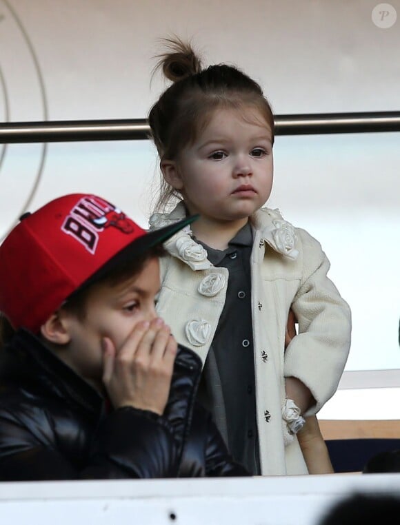 Romer et Cruz Beckham au Parc des Princes à Paris le 9 Mars 2013.