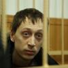 Pavel Dmitrichenko inculpé à Moscou, le 7 mars 2013, pour avoir commandité l'agression à l'acide dont a été victime Sergueï Filine.