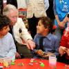 Camilla et le prince Charles ont visité un camp de réfugiés à Amman, en Jordanie, le 13 mars 2013.