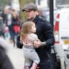 David Beckham et sa petite Harper dans les rues de Londres, le 18 mars 2013, au lendemain du match face à Saint-Etienne