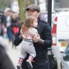 David Beckham et sa fille Harper dans les rues de Londres, le 18 mars 2013, au lendemain du match face à Saint-Etienne