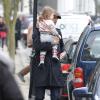 David Beckham et sa fille Harper dans les rues de Londres, le 18 mars 2013, au lendemain du match face à Saint-Etienne