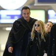  Mary-Kate Olsen et Olivier Sakozy à l'aéroport de Paris Charles-De-Gaulle début janvier 2013 
 Photo exclusive  