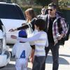 LeAnn Rimes et Eddie Cibrian vont assister au match de baseball de Jake, le fils d'Eddie, à Los Angeles, le 23 mars 2013. Le second fils d'Eddie, Mason, est également présent pour encourager son frère.