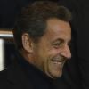 Nicolas Sarkozy tout sourire à la rencontre PSG - Montpellier au Parc des Princes, Paris, le 29 mars 2013.