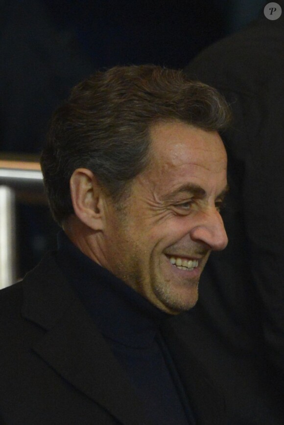 Nicolas Sarkozy tout sourire à la rencontre PSG - Montpellier au Parc des Princes, Paris, le 29 mars 2013.