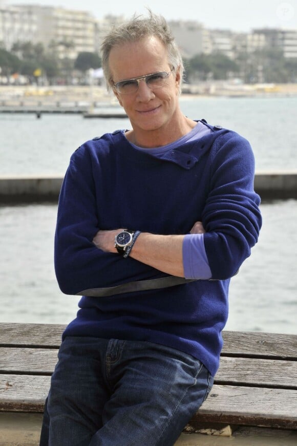 Christophe Lambert pose à la 50e édition du MipTV à Cannes, le 8 avril 2013. Il porte une montre Star Chronographe Automatique.