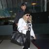 Fergie, enceinte, et son mari Josh Duhamel à l'aéroport de Los Angeles, le 8 avril 2013.