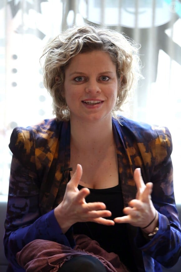 Kim Clijsters, ancienne numero 1 mondial, souriante lors d'une conférence de presse à l'occasion du lancement en France des compléments alimentaires USANA à l'hôtel W à Paris le 6 avril 2013