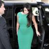 Kim Kardashian arrives at a studio in Los Angeles, CA, USA on April 17, 2013, pretty in green. The mother-to-be showed off her curvy figure in a fitted green knee length dress with matching suede heels. Photo by GSI/ABACAPRESS.COM17/04/2013 - Los Angeles